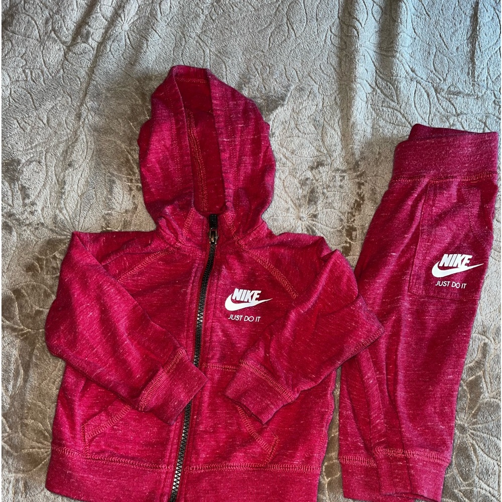 Nike out wear size 12 months.